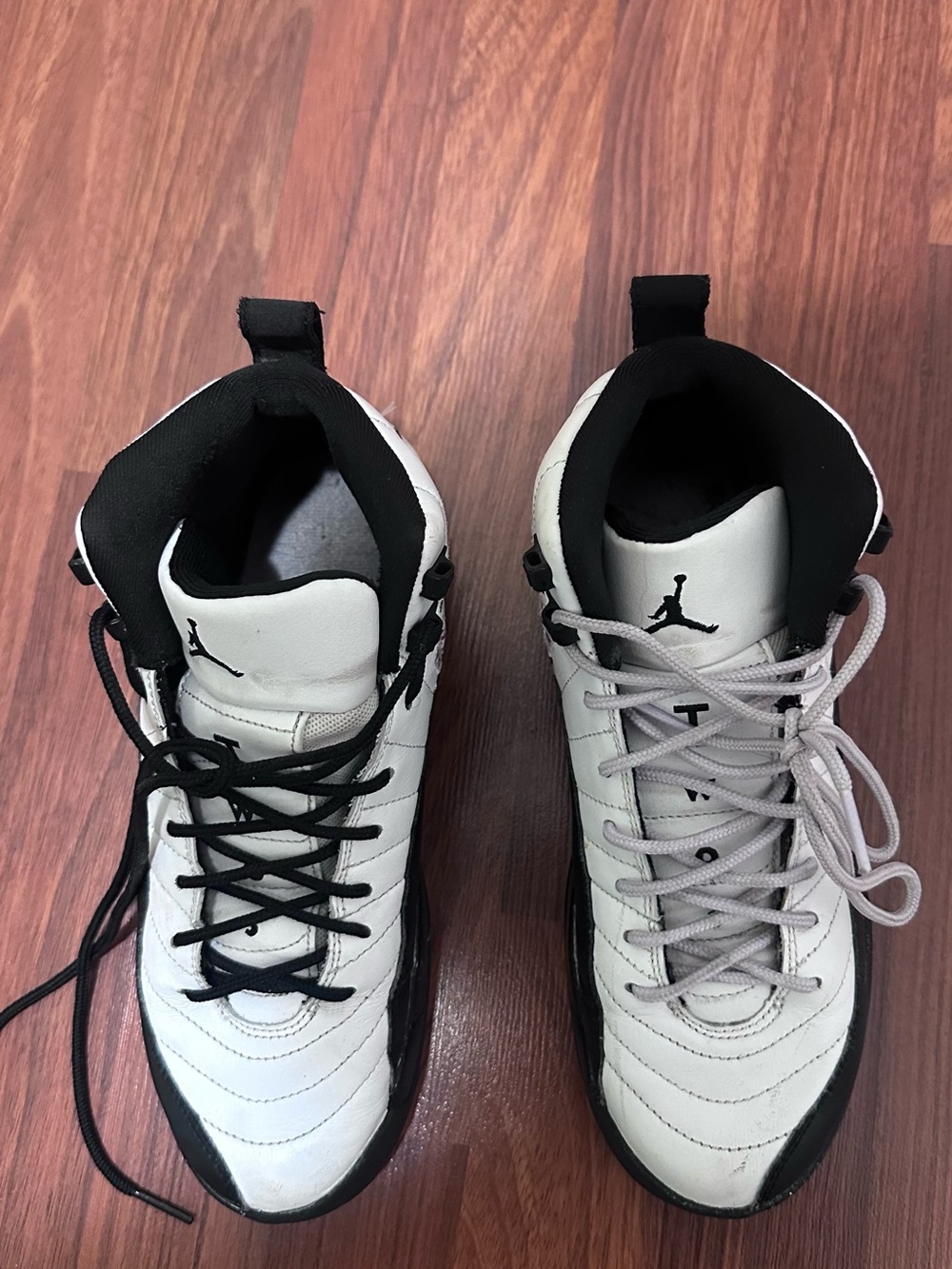 Jordan High-Top Sneakers in White and Black. Size 6.5 youth.